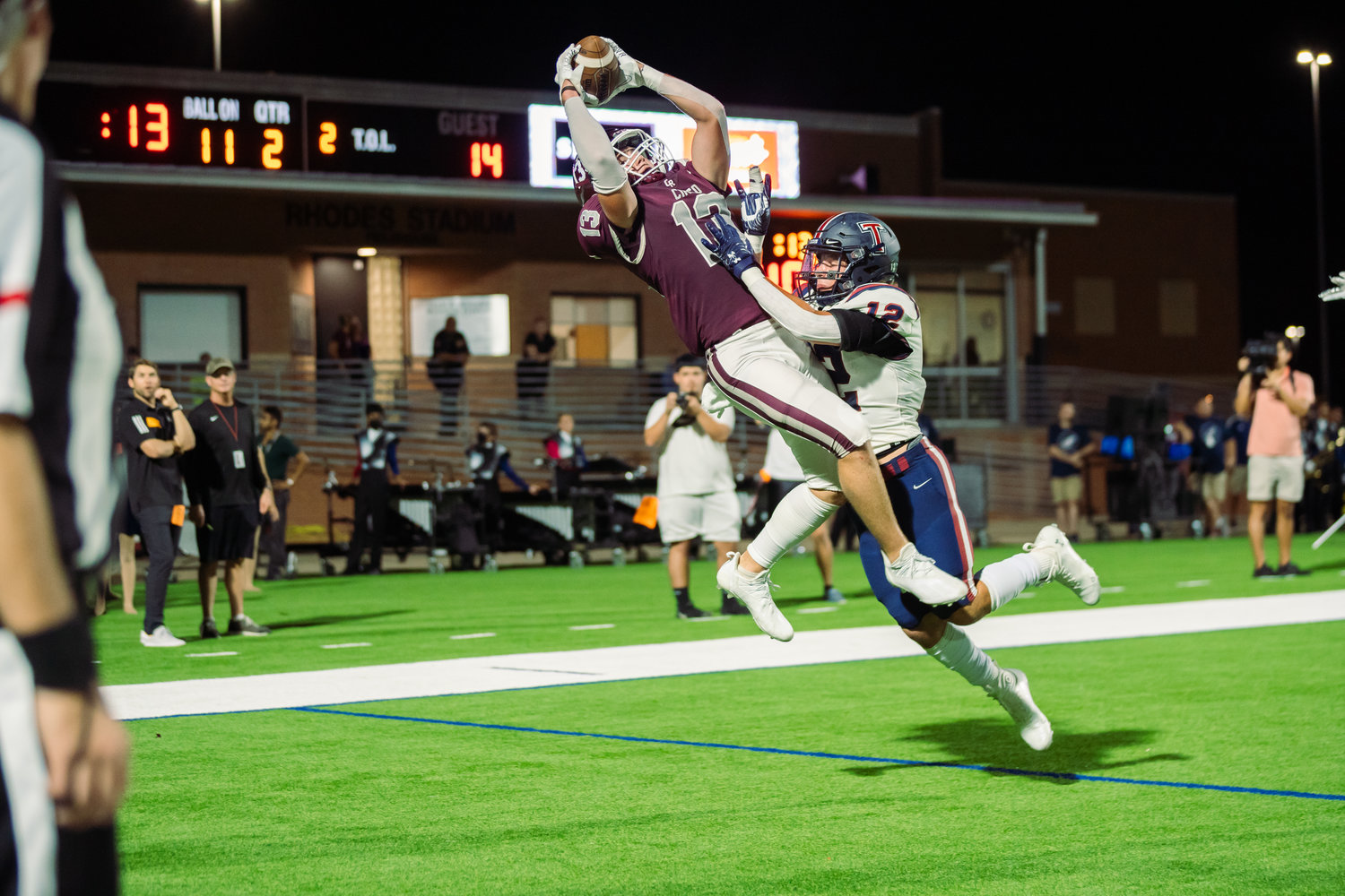 Cinco Ranch’s Fischer Reed catches a touchdown during Friday’s game between Cinco Ranch and Tompkins at Rhodes Stadium.
